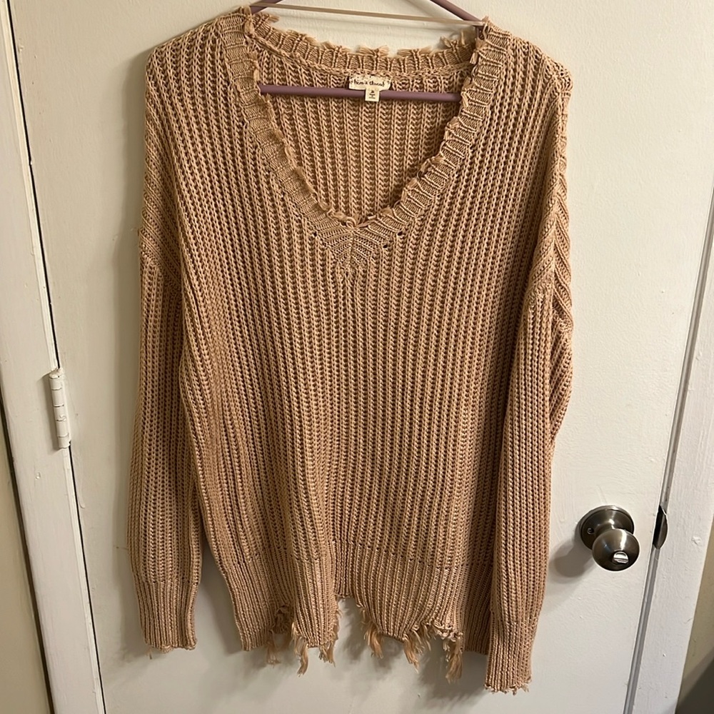 Women’s knit/frayed sweater